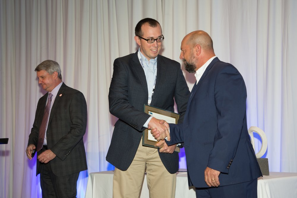 Dr. David Garber of Florida International University (FIU) received PCI's Educator of the Year Award.