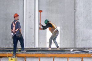 Two construction workers 