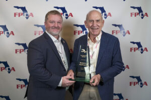 Lloyd Kennedy handing FPCA Fellowship Award 2025 to Robert Finfrock